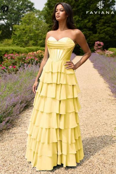 model wearing yellow Faviana prom dress