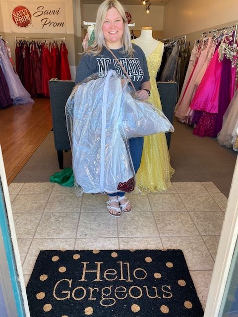 Photo of the happy customer in the showroom