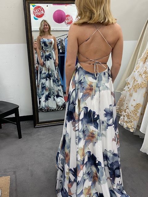 Photo of the model wearing a colorful prom gown