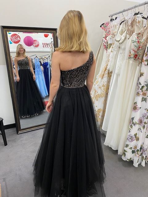 Photo of the model wearing a prom gown